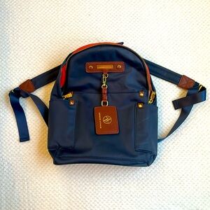 Adrienne Vittadini nylon navy backpack w gold zipper and magnetic front pocket